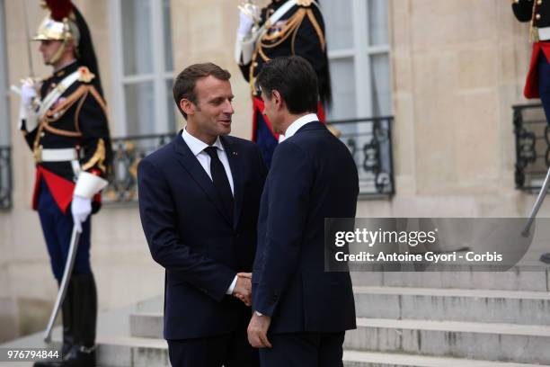 French President Emmanuel Macron and Italian Prime Minister, Giuseppe Conte leave the Elysee Palace on June 15, 2018 in Paris France. President...