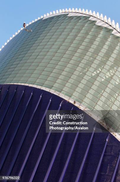 October 2009 - Valencia, Spain - The building site of the Agora. A worker is scaling the roof of the structure. The building is the latest addition...