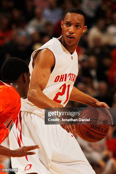 Guard Evan Turner of the Ohio State Buckeyes controls the ball against the Illinois Fighting Illini in the semifinals of the Big Ten Men's Basketball...