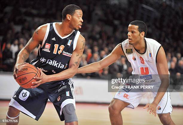 Cholet's Samuel Mejia vies with Gravelines' s Juby Johnson during their French PRO A basketball match Cholet versus Gravelines-Dunkerque, on March 14...