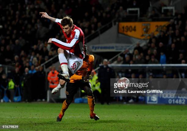 Nicklas Bendtner of Arsenal scores the 2nd goal during the Barclays Premier League match between Hull City and Arsenal at KC Stadium on March 13,...