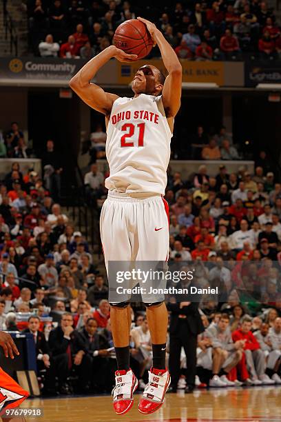 Guard Evan Turner of the Ohio State Buckeyes takes a jump shot against the Illinois Fighting Illini in the semifinals of the Big Ten Men's Basketball...