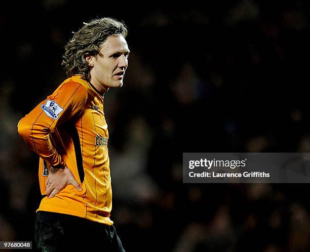 Jimmy Bullard of Hull City shows his dismay after Nicklas Bendtner of Arsenal scores the winner during the Barclays Premier League match between Hull...