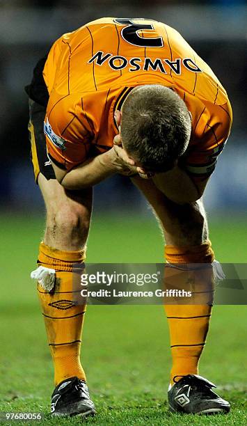 Andy Dawson of Hull City shows his dismay after Nicklas Bendtner of Arsenal scores the winner during the Barclays Premier League match between Hull...