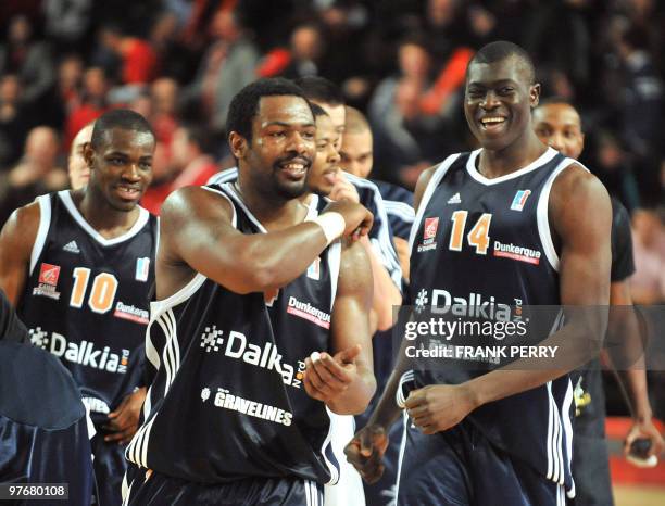 Gravelines' players celebrate after winning their French ProA basketball match against Cholet on March 13, 2010 in Cholet. AFP PHOTO FRANK PERRY