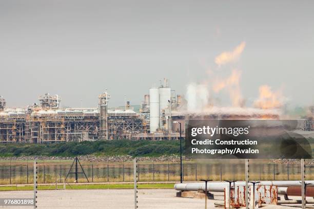 Flaring off gas at a gas processing plant at Rampside near Barrow in Furness, UK, that processes gas from the Morecambe Bay gas field, it is one of...