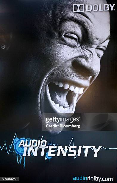 Promotional poster for Dolby audio technology sits on display at the headquarters of Dolby Laboratories Inc. In San Francisco, U.S., on Friday, March...