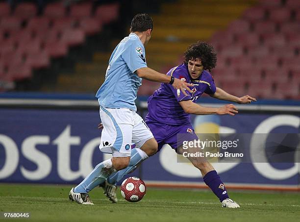 Stevan Jovetic of ACF Fiorentina and Christian Maggio of SSC Napoli in action during the Serie A match between SSC Napoli and ACF Fiorentina at...