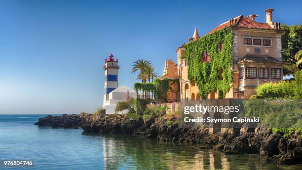 building on coast, cascais, portugal - cascais portugal stock pictures, royalty-free photos & images