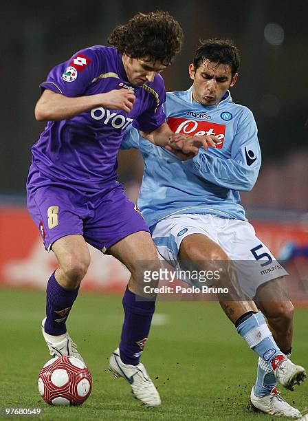 Stevan Jovetic of ACF Fiorentina and Michele Pazienza of SSC Napoli in action during the Serie A match between SSC Napoli and ACF Fiorentina at...
