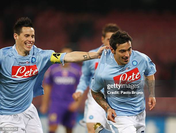 Ezequiel Lavezzi of SSC Napoli celebrates the opening goal with his teammate Marek Hamsik during the Serie A match between SSC Napoli and ACF...