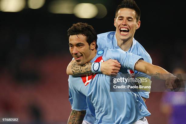 Ezequiel Lavezzi of SSC Napoli celebrates the opening goal with his teammate Marek Hamsik during the Serie A match between SSC Napoli and ACF...