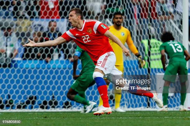 Artem Dzyuba of Russia celebrates after scoring his team`s third goal during the 2018 FIFA World Cup Russia group A match between Russia and Saudi...