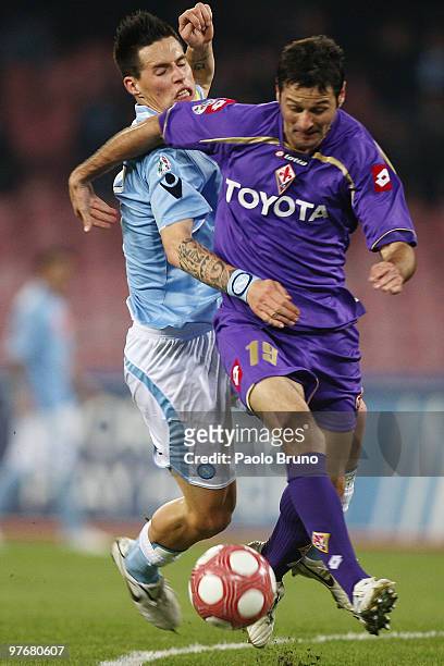 Marek Hamsik of SSC Napoli and Massimo Gobbi of ACF Fiorentina in action during the Serie A match between SSC Napoli and ACF Fiorentina at Stadio San...