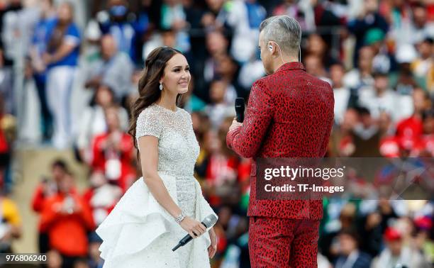 Aida Garifullina and Robbie Williams perform prior to the 2018 FIFA World Cup Russia group A match between Russia and Saudi Arabia at Luzhniki...