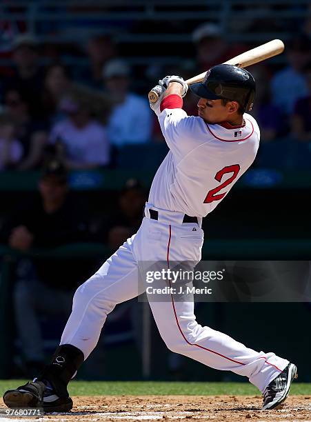 Outfielder Jacoby Ellsbury of the Boston Red Sox fouls off a pitch against the Pittsburgh Pirates during a Grapefruit League Spring Training Game at...