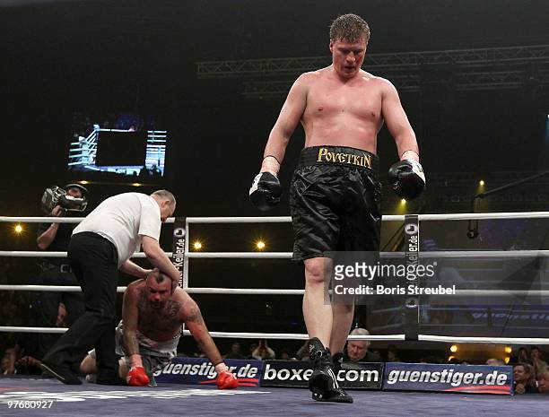Alexander Povetkin of Russia knocks out Javier Mora of Mexico during the fifth round of their Heavyweight fight at the Max-Schmeling-Halle on March...