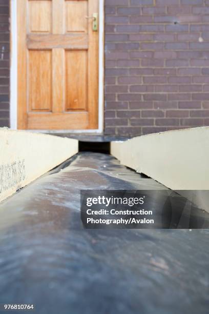 Under floor insulation in a house extension in Ambleside, UK.