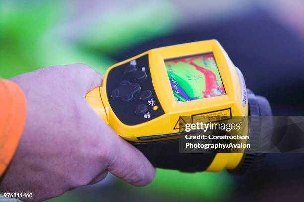 Man uses a thermal imaging camera to test how dried out a Carlisle house is after the floods.