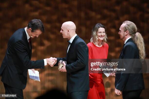 April 2018, Hamburg, Germany: Editor-in-cheif of Speigel magazine, Klaus Brinkbaumer and journalist and jury member Anja Reschke , present Dominik...