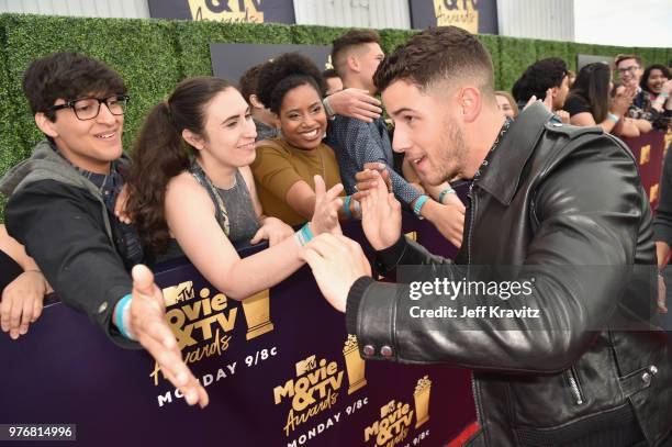 Singer Nick Jonas attends the 2018 MTV Movie And TV Awards at Barker Hangar on June 16, 2018 in Santa Monica, California.