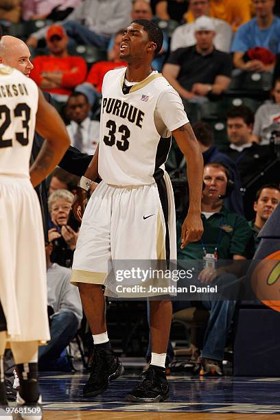 Guard E'Twaun Moore of the Purdue Boilermakers gets up after injuring himself during the game the Minnesota Golden Gophers in the semifinals of the...