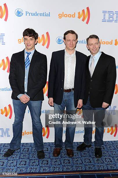 Actors Michael Urie, Arnie Burton and Matthew Schneck attend the 21st Annual GLAAD Media Awards at The New York Marriott Marquis on March 13, 2010 in...