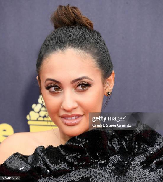 Francia Raisa arrives at the 2018 MTV Movie And TV Awards at Barker Hangar on June 16, 2018 in Santa Monica, California.