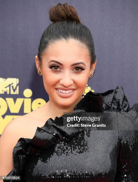 Francia Raisa arrives at the 2018 MTV Movie And TV Awards at Barker Hangar on June 16, 2018 in Santa Monica, California.