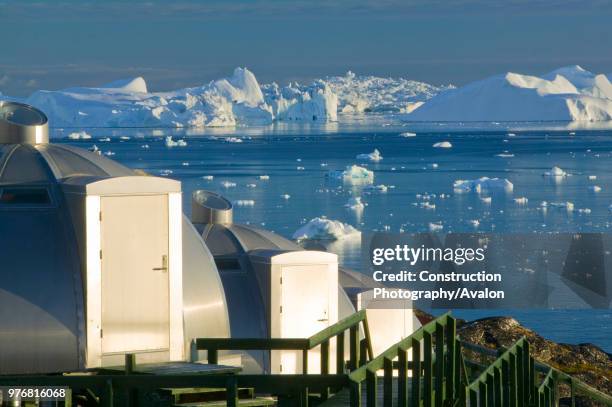Igloos outside the Arctic Hotel in Ilulissat on Greenland Ilulissat is a UNESCO World Heritage Site because of the Jacobshavn Glacier or Sermeq...