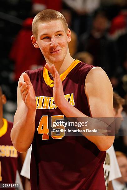 Center Colton Iverson of the Minnesota Golden Gophers celebrates after defeating the Purdue Boilermakers 69-42 in the semifinals of the Big Ten Men's...