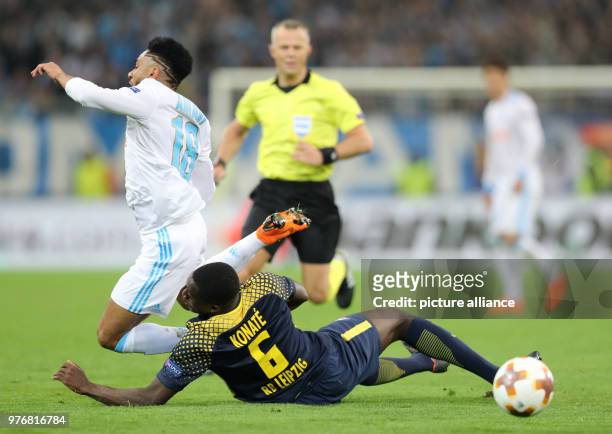 April 2018, France, Marseille: Football, Europa League quarter final, Olympique Marseille vs RB Leipzig at the Orange Velodrome. Ibrahima Konate of...