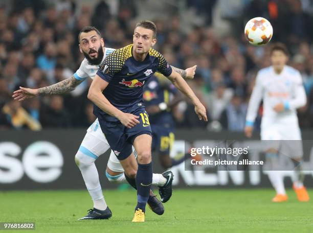 April 2018, France, Marseille: Football, Europa League quarter final, Olympique Marseille vs RB Leipzig at the Orange Velodrome. Stefan Ilsanker of...