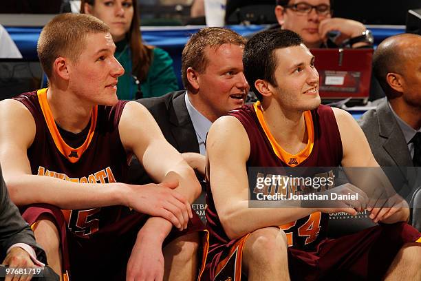 Guard Blake Hoffarber and center Colton Iverson of the Minnesota Golden Gophers react in the final moments of their 69-42 win over the Purdue...