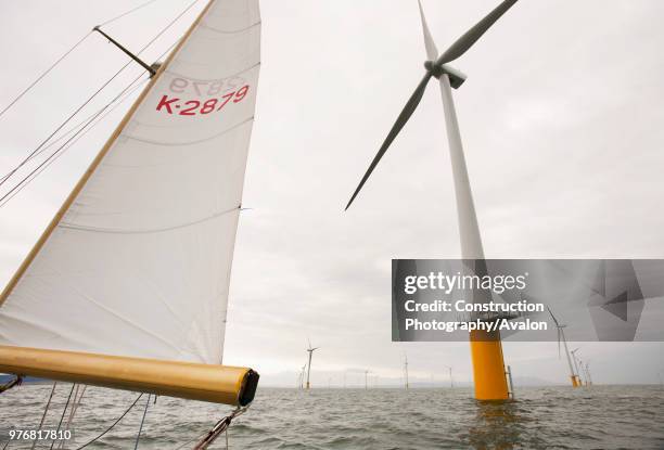 Sailing at the newly built Robin Rigg offshore wind farm in the solway firth between Cumbria and Scotland.