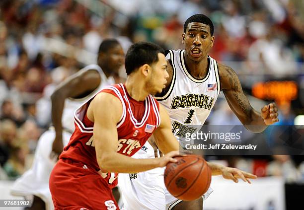 Iman Shumpert of the Georgia Tech Yellow Jackets guards Javier Gonzalez of the North Carolina State Wolfpack in their semifinal game in the 2010 ACC...