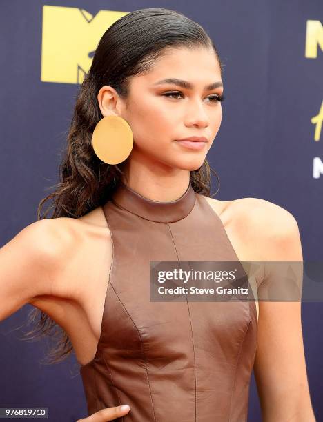 Zendaya arrives at the 2018 MTV Movie And TV Awards at Barker Hangar on June 16, 2018 in Santa Monica, California.