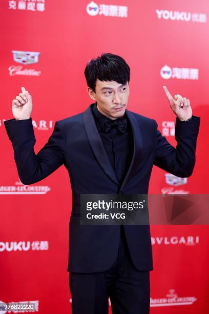 Actor Chang Chen arrives at red carpet during the opening ceremony of the 21st Shanghai International Film Festival at Shanghai Grand Theatre on June...