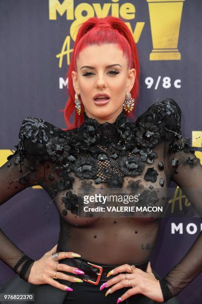 Rapper Justina Valentine attends the 2018 MTV Movie & TV awards, at the Barker Hangar in Santa Monica on June 16, 2018. - This year's show is not...