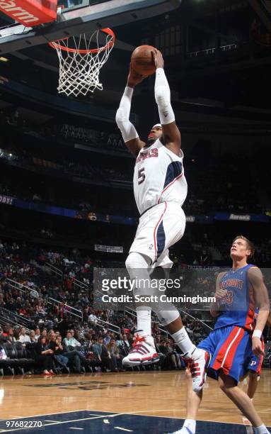 Josh Smith of the Atlanta Hawks dunks against the Detroit Pistons on March 13, 2010 at Philips Arena in Atlanta, Georgia. NOTE TO USER: User...