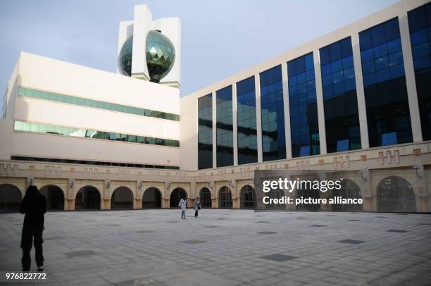 April 2018, Tunisia, Tunis: Visitor walk across a large square at the 'Cité de la Culture' . The Cité de la Culture was a prestige project of former...