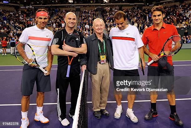 Rafael Nadal of Spain, his doubles teammate Andre Agassi, tennis legend Rod Laver, former player Pete Sampras, and Roger Federer of Switzerland,...