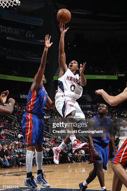 Jeff Teague of the Atlanta Hawks shoots against the Detroit Pistons on March 13, 2010 at Philips Arena in Atlanta, Georgia. NOTE TO USER: User...