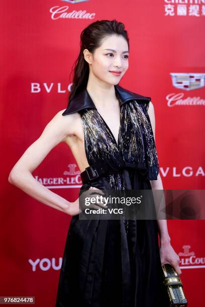 Actress Elane Zhong Chuxi arrives at red carpet during the opening ceremony of the 21st Shanghai International Film Festival at Shanghai Grand...