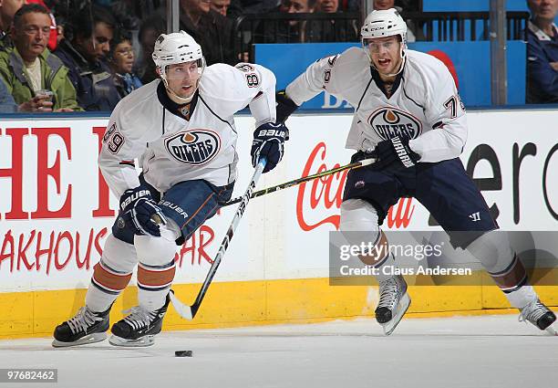 Sam Gagner of the Edmonton Oilers carries the puck in a game against the Toronto Maple Leafs on March 13, 2010 at the Air Canada Centre in Toronto,...