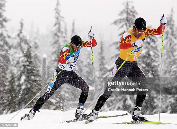 Brian McKeever of Canada competes with his guide during the Men's 3km Pursuit Visually Impaired Biathlon on Day 2 of the 2010 Vancouver Winter...