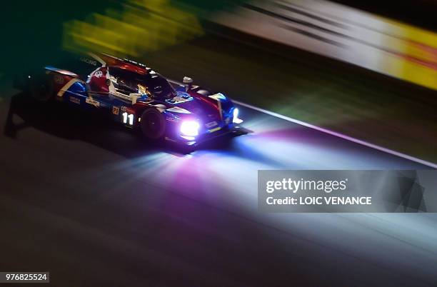 Engineering BR1 AER LM P1 Russian driver Vitaly Petrov competes during the 86th Le Mans 24-hours endurance race, at the Circuit de la Sarthe at night...