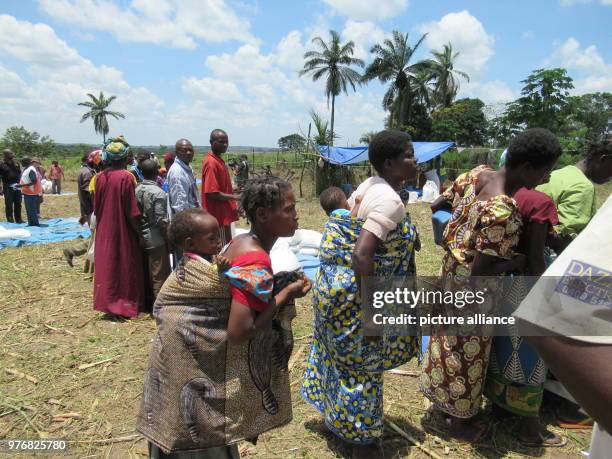 March 2018, Congo, Kananga: Mothers and babies wait in line for rations at a World Food Program distribution site in Congo's troubled Kasai region....