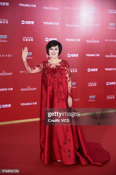 Celebrity Yue-Sai Kan arrives at red carpet during the opening ceremony of the 21st Shanghai International Film Festival at Shanghai Grand Theatre on...