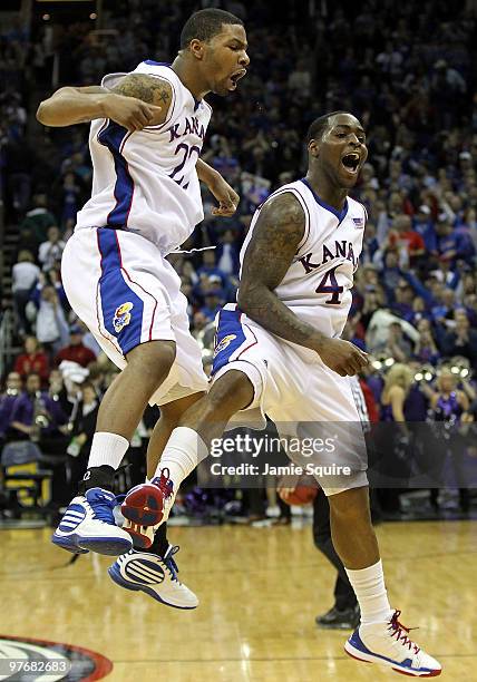 Marcus Morris and Sherron Collins of the Kansas Jayhawks celebrate at the buzzer as the Jayhawks defeated the Kansas State Wildcats to win the 2010...